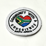 Community with a Conscience, badge